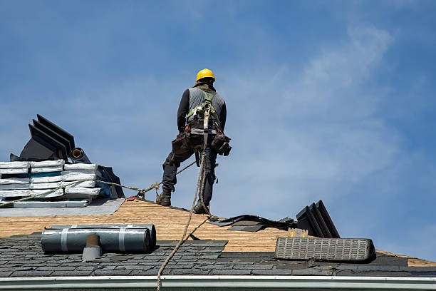 Professional Roofing technician working in Tennent, NJ